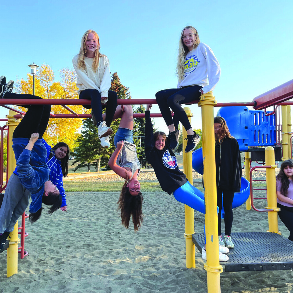 girls on monkey bars